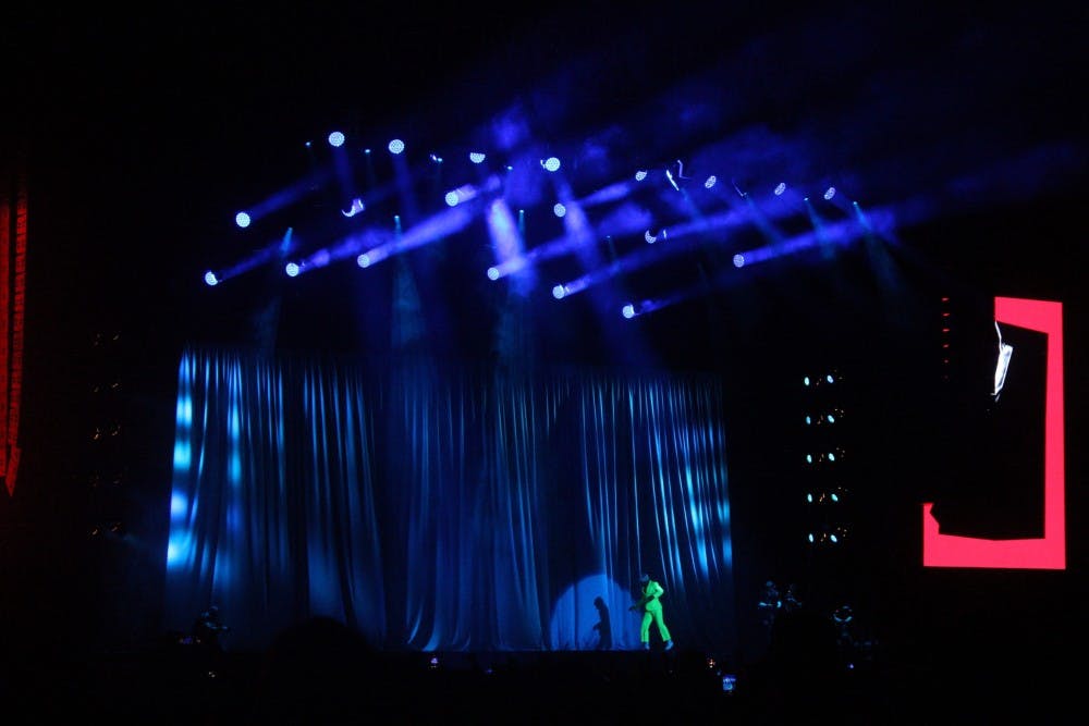 Tyler, the Creator, or IGOR, kept audience members entertained Friday with his neon-green suit and blonde wig as he played through the No.-1 album in the country.