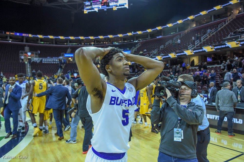 <p>Sophomore guard CJ Massinburg walks off the court after the Bulls' loss to Kent State. Thursday's loss eliminates Buffalo from the MAC Tournament.&nbsp;</p>