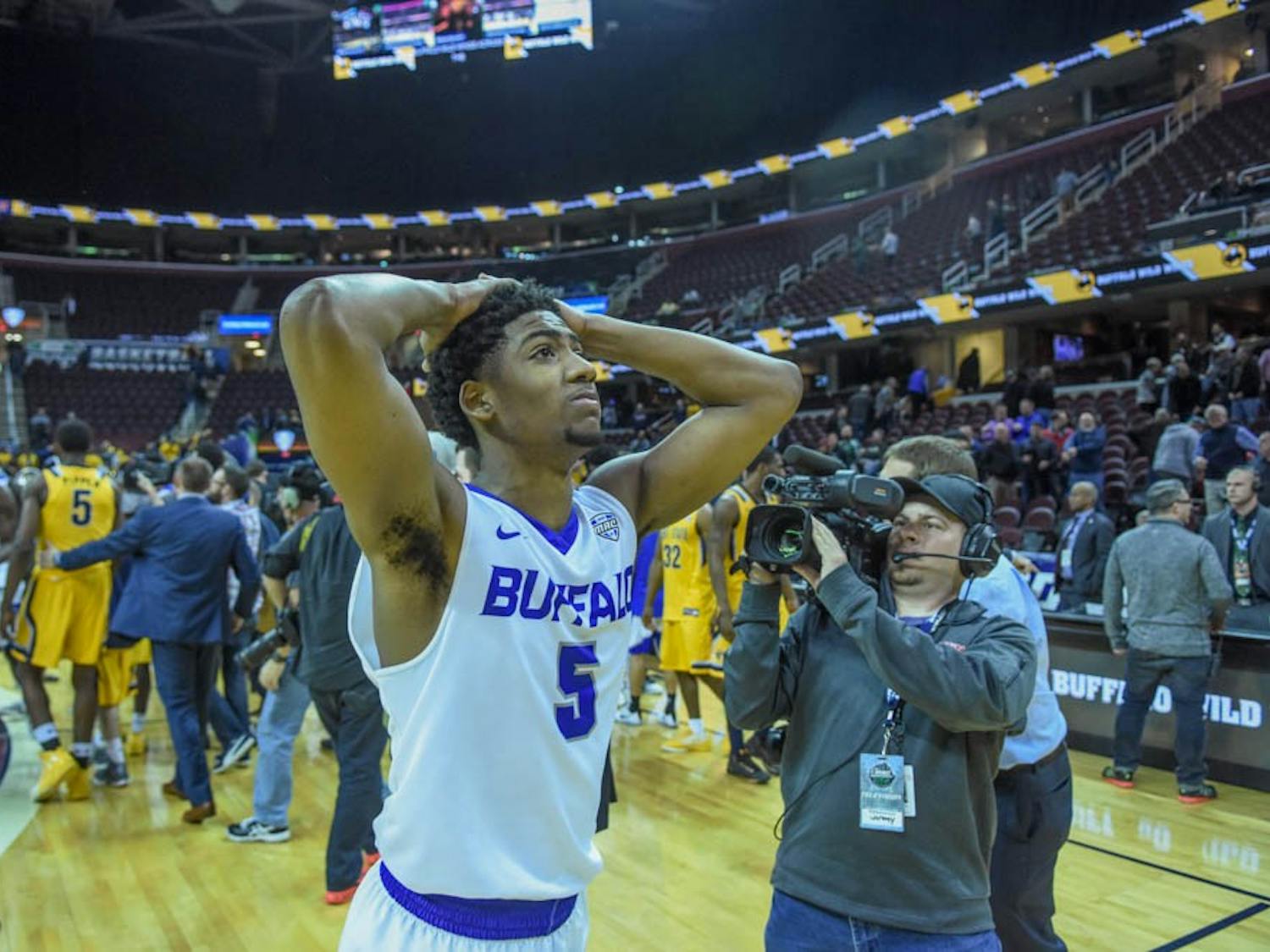 Sophomore guard CJ Massinburg walks off the court after the Bulls' loss to Kent State. Thursday's loss eliminates Buffalo from the MAC Tournament. 