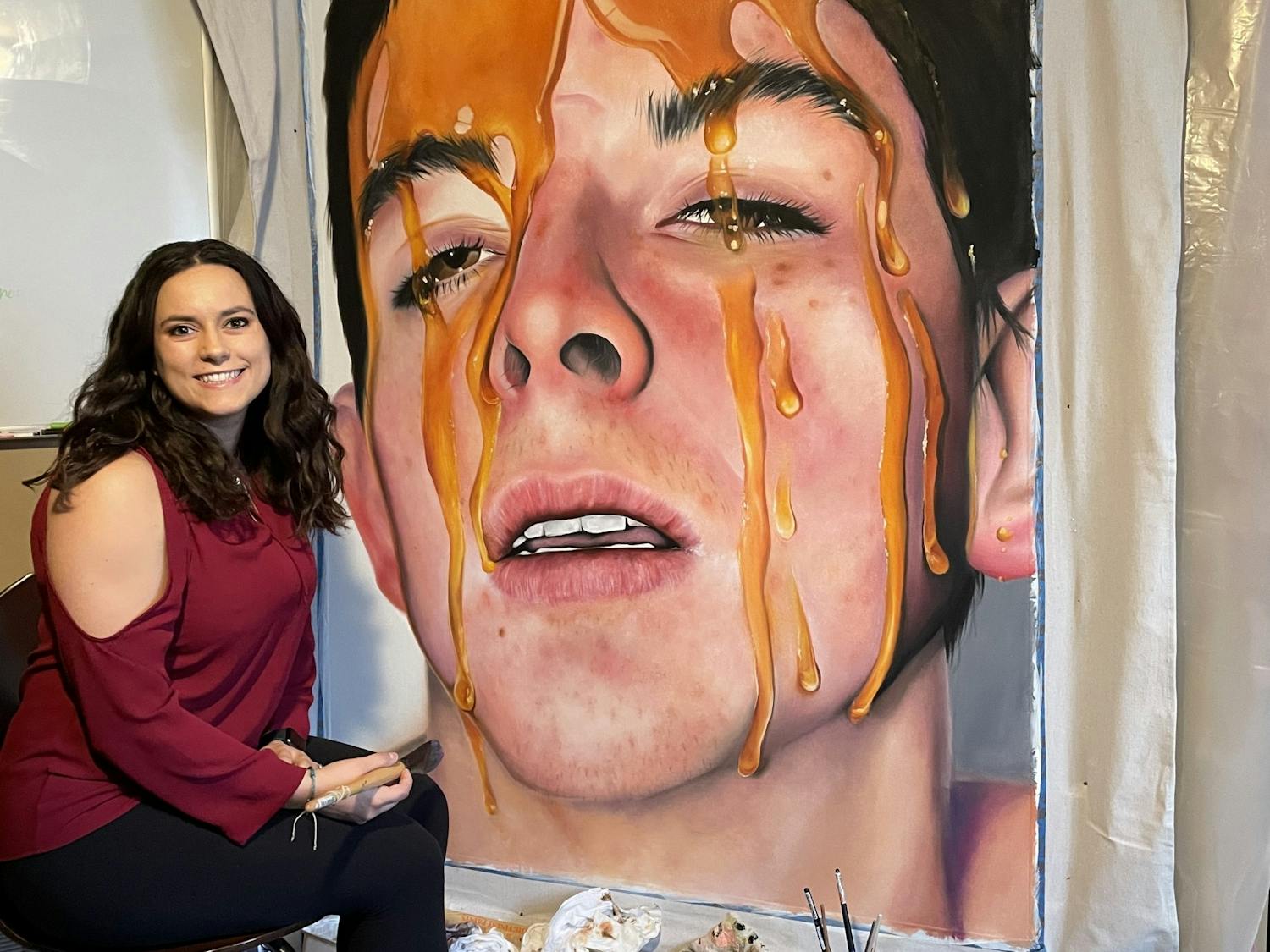 Gianna Damico says she prefers oil paints and likes to create works that are big and colorful.