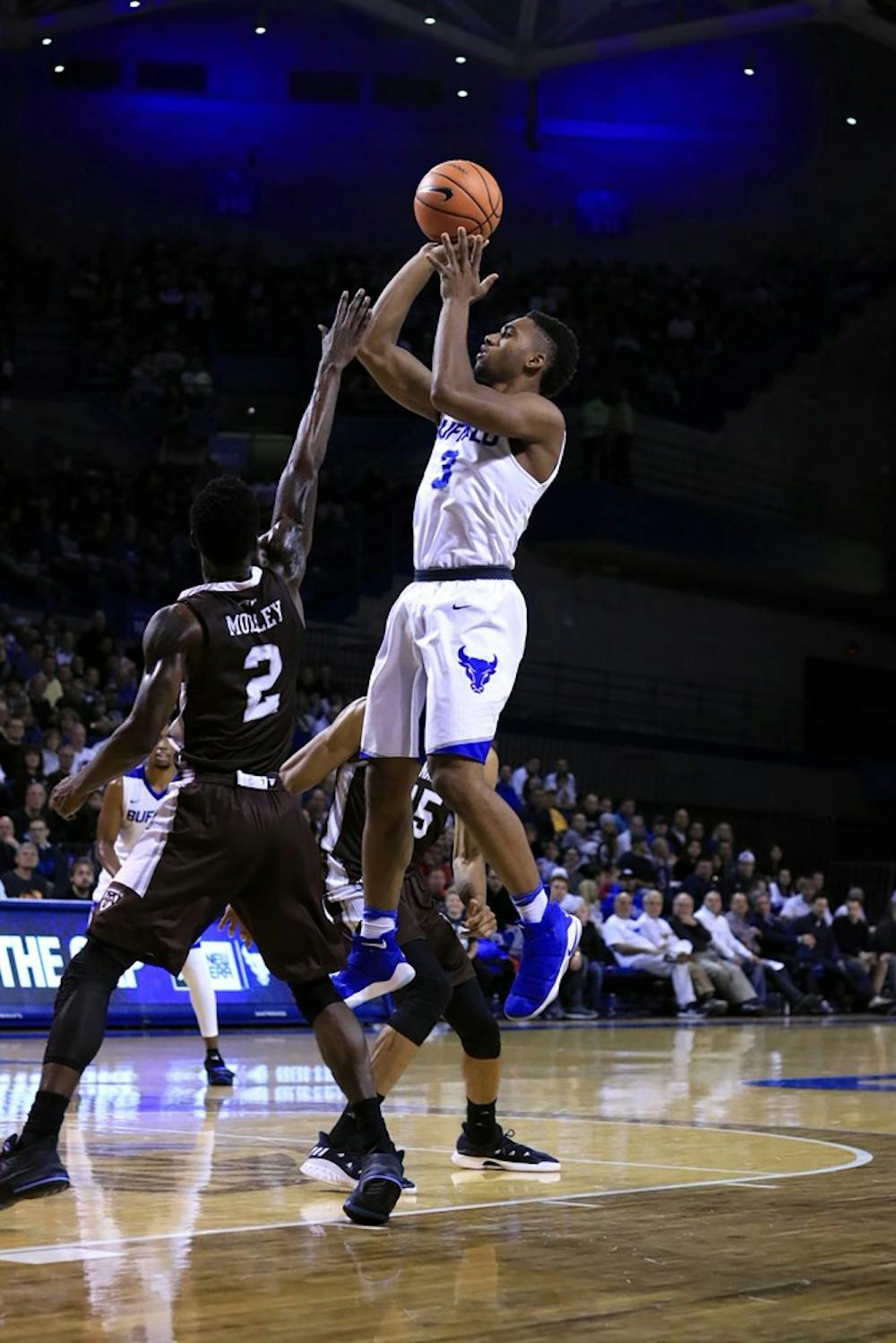 <p>Freshman guard Jayvon Graves takes a shot against St. Bonaventure. Graves finished Saturday with three blocks.</p>