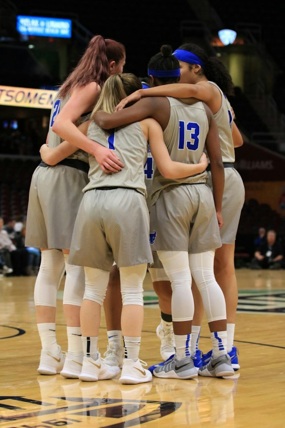 <p>The Bulls huddle during the MAC tournament finals on Saturday. The Bulls lost to the Central Michigan Chippewas 96-91 in the championship game.</p>
