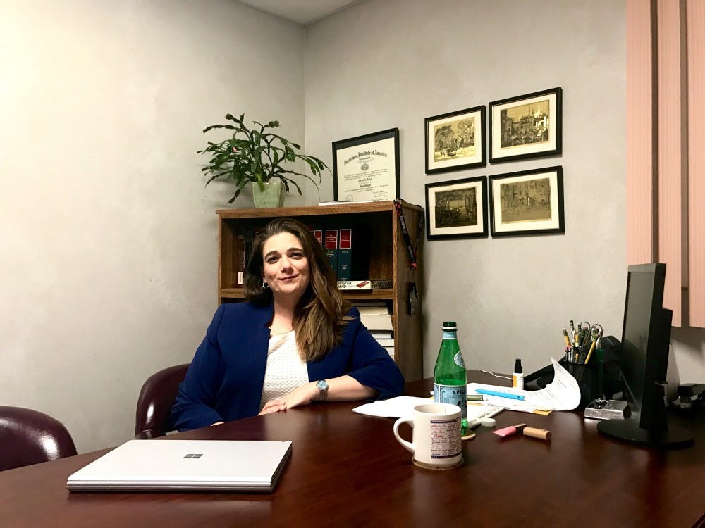 Erin Decker, a UB Law grad, battled cancer and adversity, getting a perfect score on her law exam.