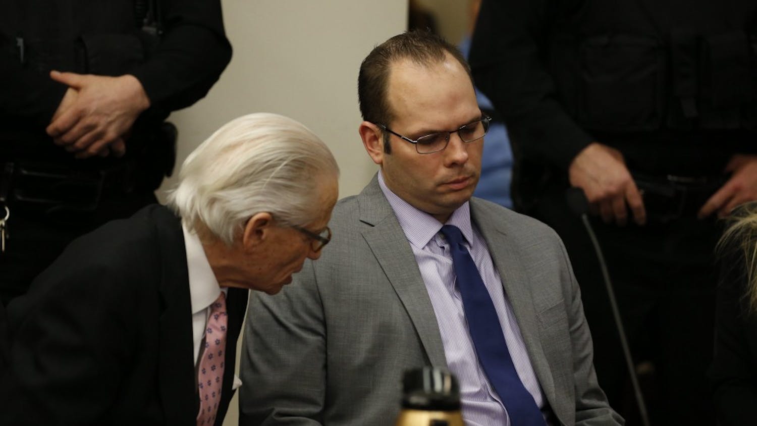 Jeffrey Basil, right, and his defense attorney Joel Daniels, left, react after Basil was found guilty of 2nd degree murder  and tampering with evidence on Wednesday, Jan. 21, 2015, by a jury presided over by Justice Penny M. Wolfgang in Erie County Court.  (John Hickey/Buffalo News, pool)