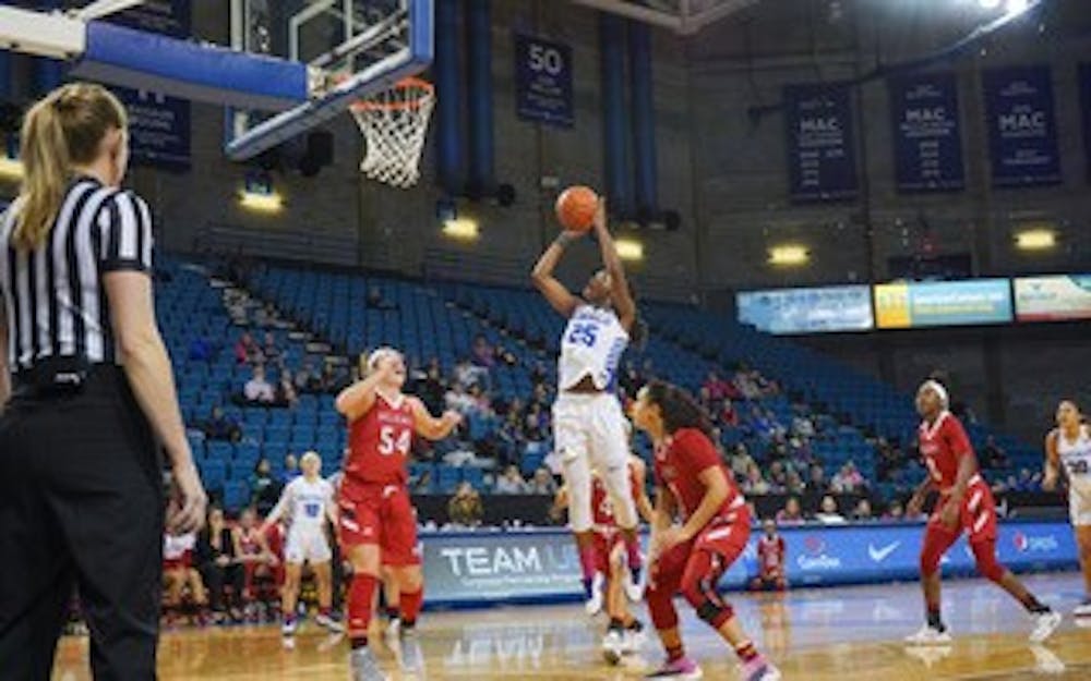 <p>Sophomore forward Adebola Adeyeye goes up for the shot.</p>