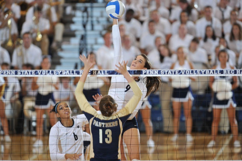 <p>Blair Brown Lipsitz (9) spikes the ball as a member of the Penn State volleyball team from 2007-10. Lipsitz, now the Bulls head coach, will take on her former team in her first game as a head coach. </p>
