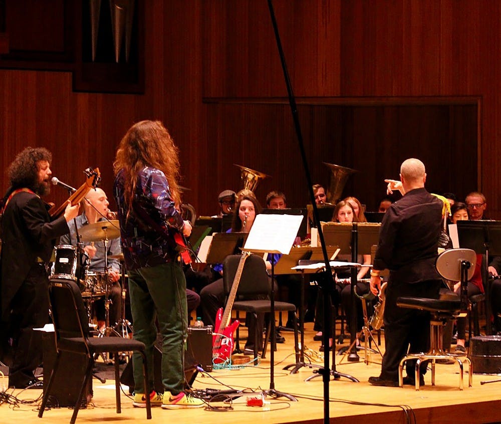 <p>The UB Concert Band, led by Director Jon Nelson, and the Genkin Philharmonic took the stage at Slee Recital Hall Tuesday night. The two groups put on an exciting show, despite their visible differences.&nbsp;</p>