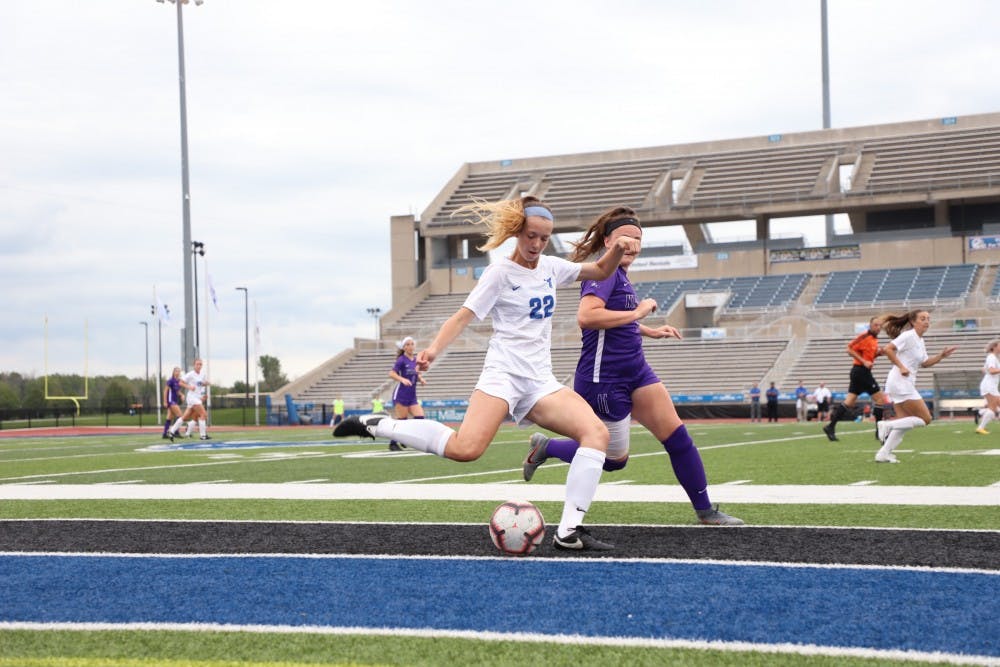 Tess Ford goes in for a challenge to win the possession back for UB.