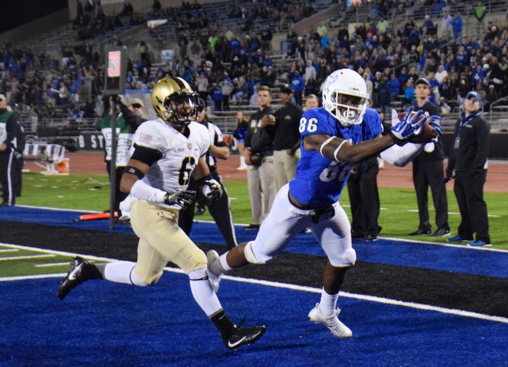 <p>UB junior wide receiver Kamathi Holsey catches a touchdown pass in the fourth quarter of Saturday's 23-20 win against Army.</p>