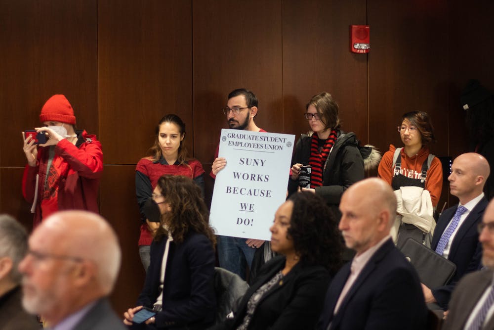 <p>Graduate Student Employees Union members protested for higher minimum stipends and the elimination of fees during the December 2022 UB Council meeting.&nbsp;</p>