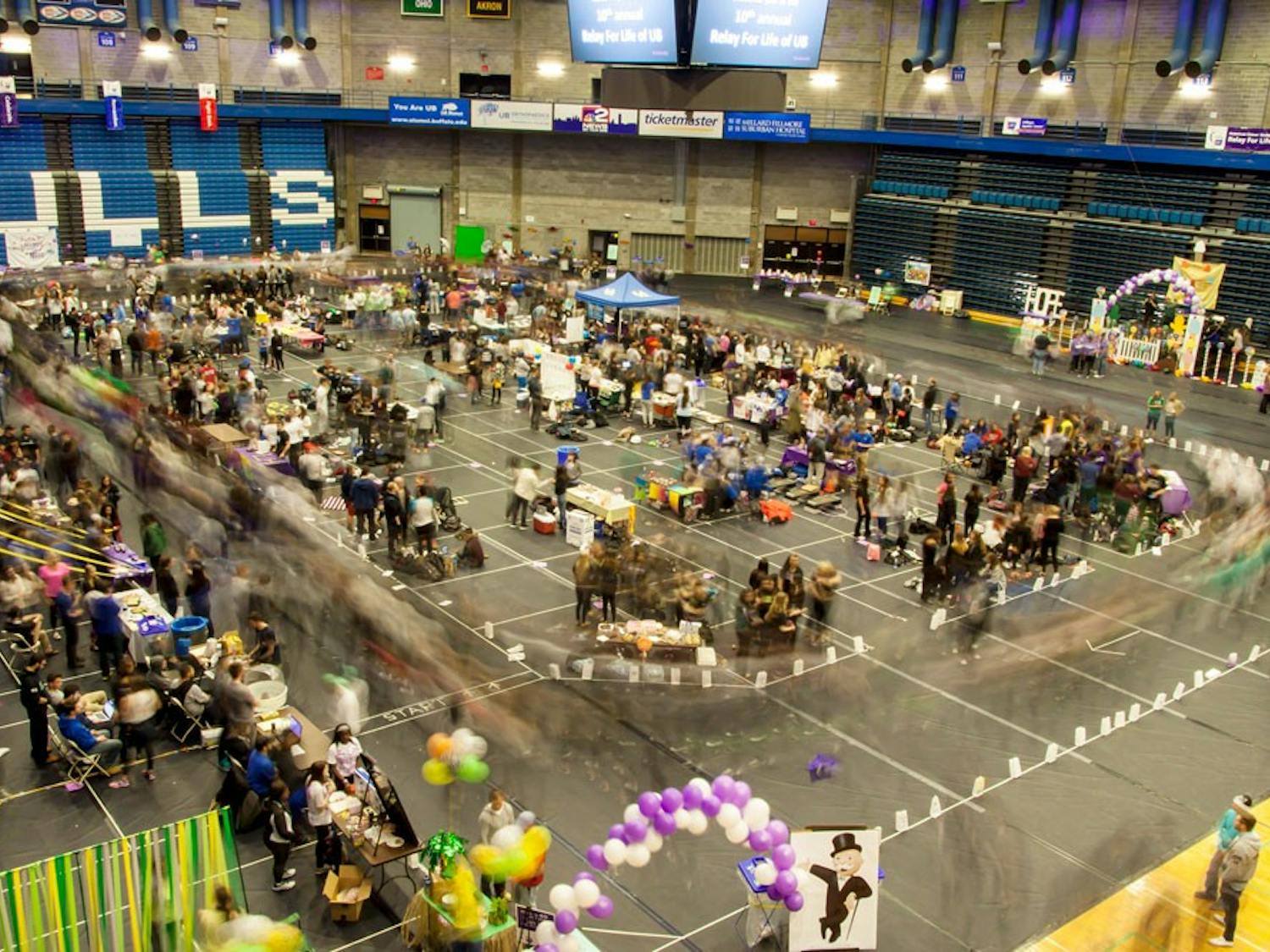 UB Relay for Life was held Friday in Alumni Arena. Over 84 teams and 1,486 participants raised $52,930.15 for cancer research. Throughout the 12-hour event, participants walked around the track and visited tables with decorations, candy and games set up throughout Alumni.