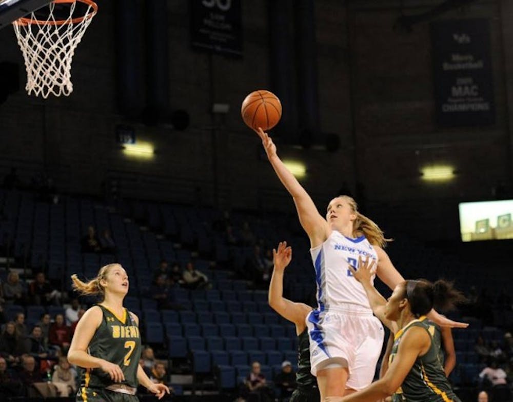 Junior guard Mackenzie Loesing with two of her 13 points in Buffalo&#39;s 58-50 loss to Siena to open the season.
Yusong Shi, The Spectrum