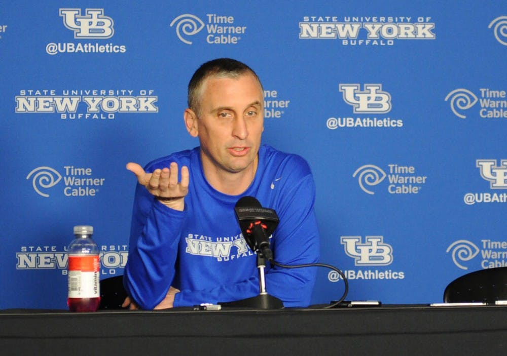 <p>Bobby Hurley speaks to the media at Alumni Arena Tuesday. Hurley will use his vast NCAA tournament experience to get the Bulls ready to face West Virginia Friday. </p>