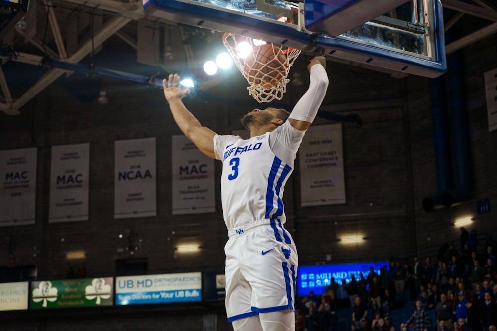 <p>Junior guard Jayvon Graves driving to the basket for an easy layup.</p>