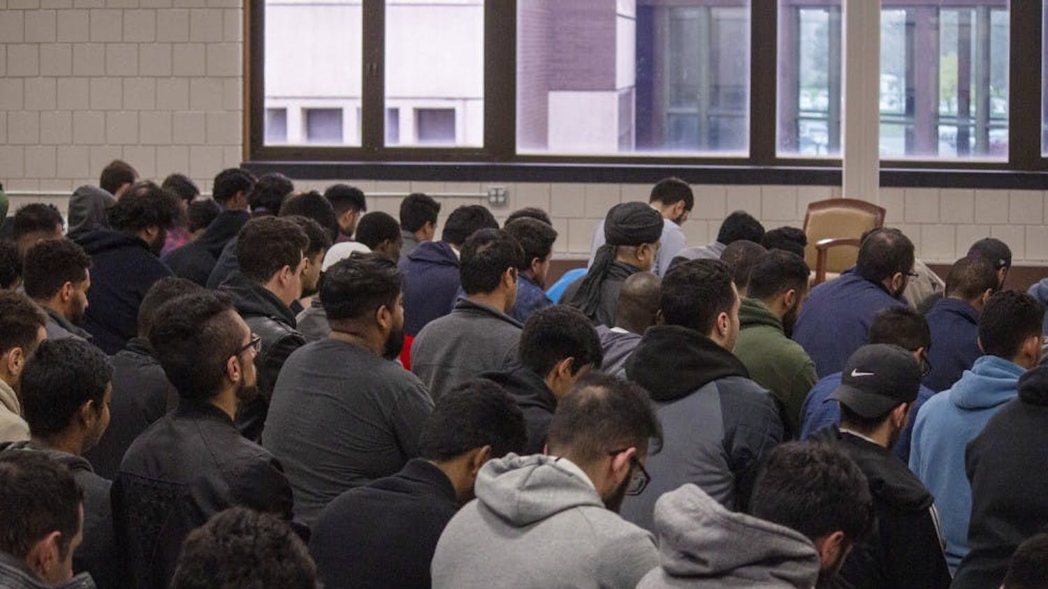 Muslim students gathering to pray in 2019.