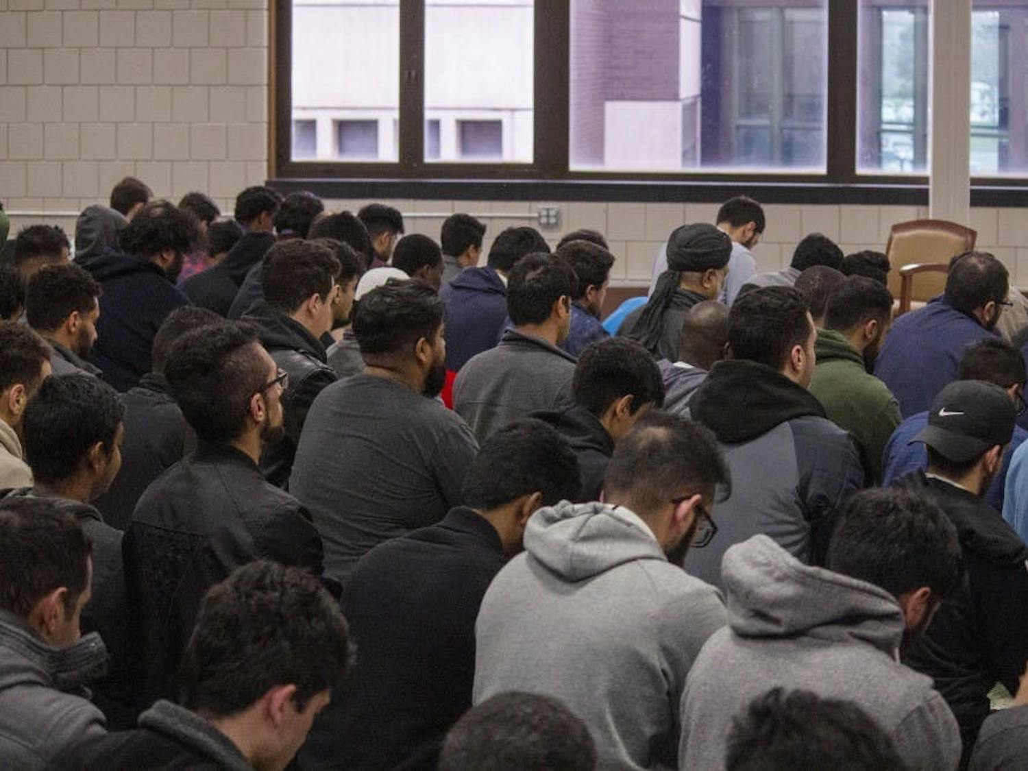 Muslim students gathering to pray in 2019.