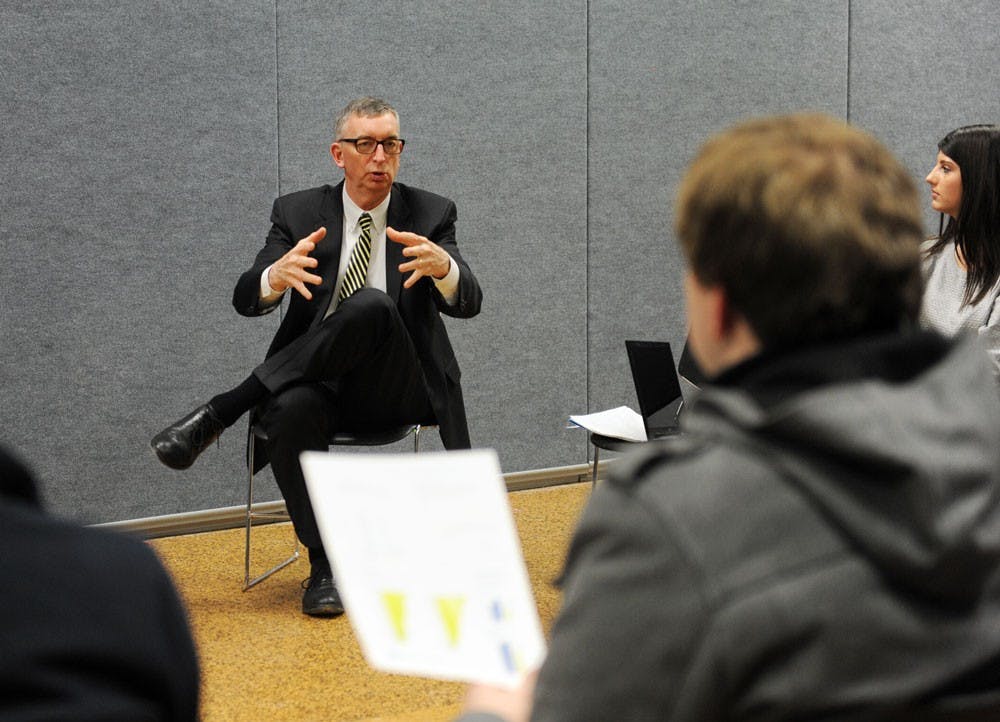 <p>Senior Vice Provost for Academic Affairs Scott Weber speaks to a sparsely attended town hall style meeting about NYSUNY 2020's rational tuition plan, which calls for yearly tuition increases for UB students.</p>
