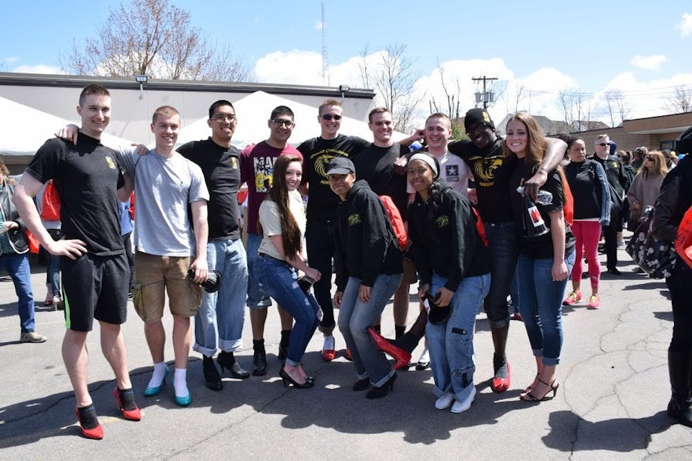 <p>Members of the ROTC club showed their support for Walk a Mile in Her Shoes by donning heels and walking about a mile around downtown Buffalo.</p>