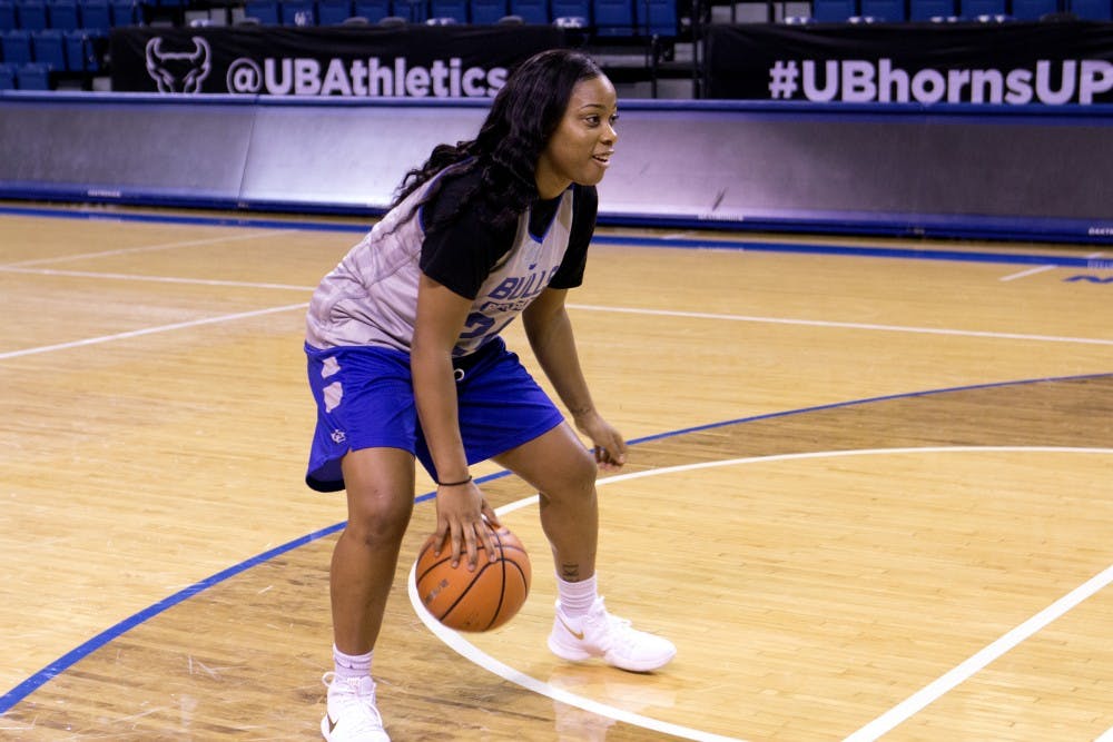 <p>Junior guard Cierra Dillard dribbling the ball in practice. Dillard is looking to be a top scorer for the Bulls this year.</p>