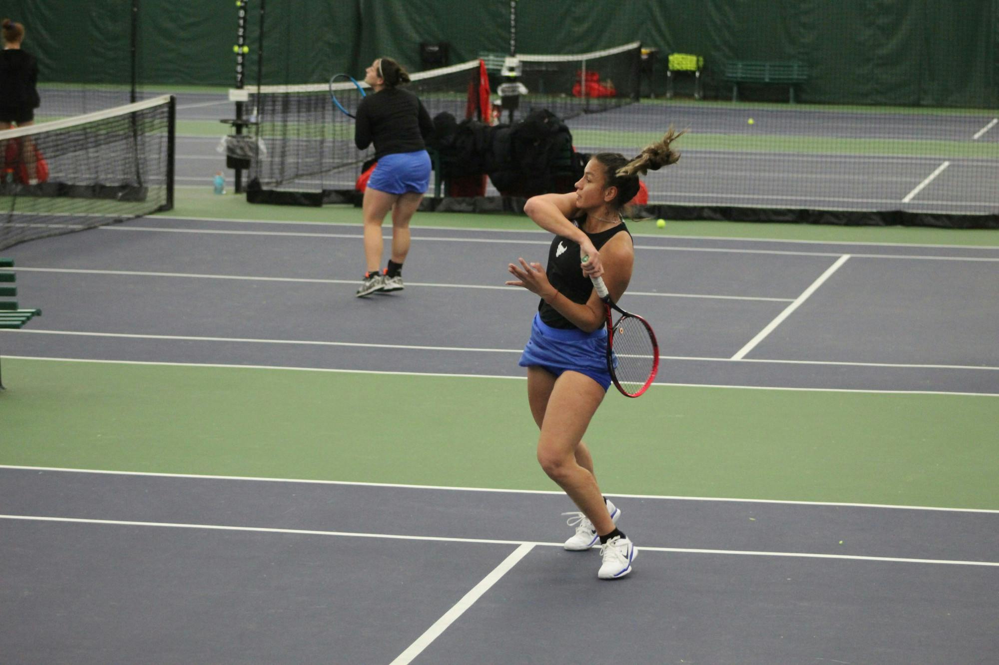 Senior Nikoleta Antoniou-Karademitrou returns the ball in a match against Ball State last season.