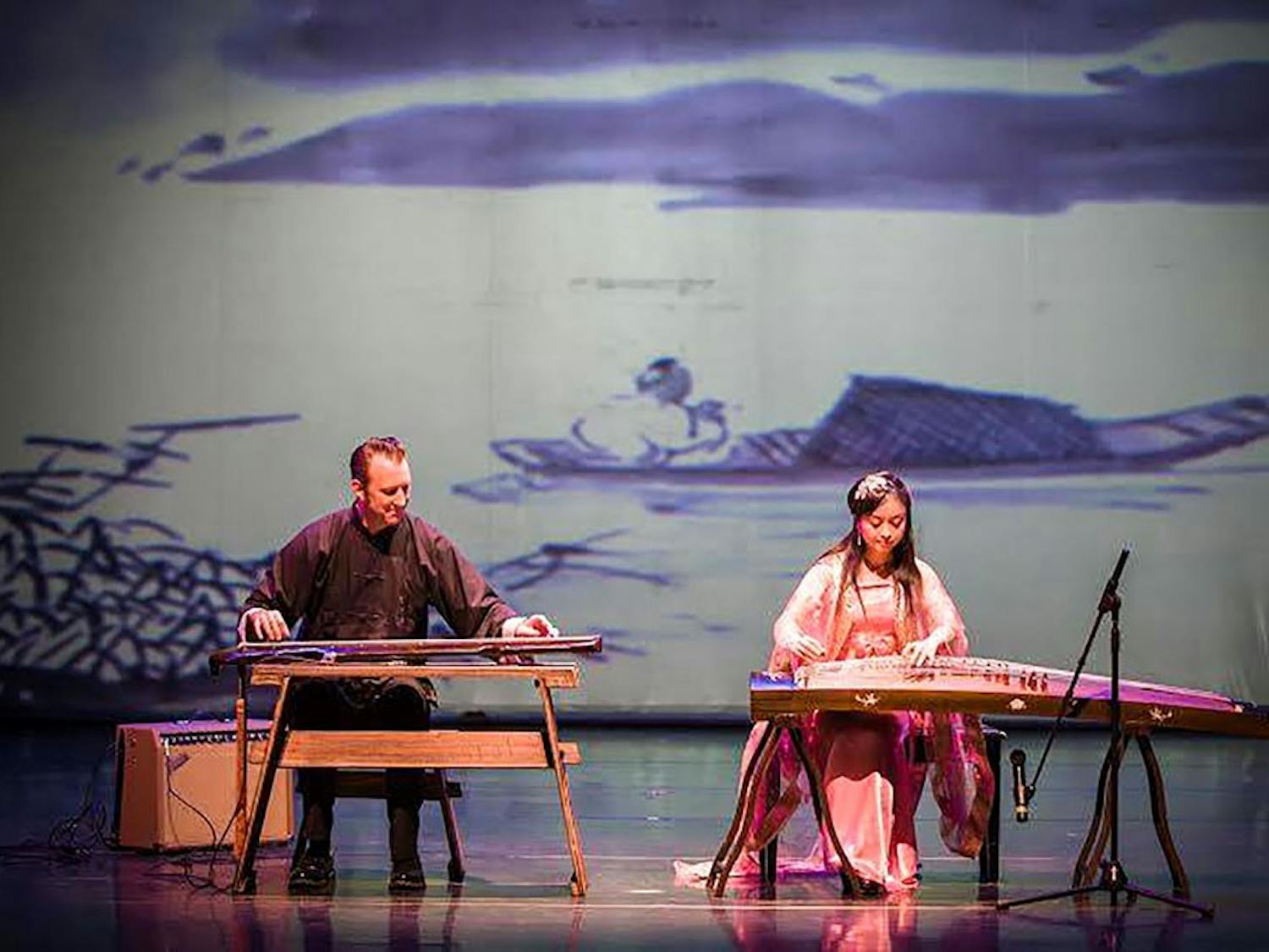 Peter Worden (left)&nbsp;and Daisy Wu (right)&nbsp;perform a song for the Chinese New Year Celebration. For the fifth year in a row, the UB Confucius Institute is holding a performance in Center for the Arts to teach students about Chinese New Year culture and traditions .