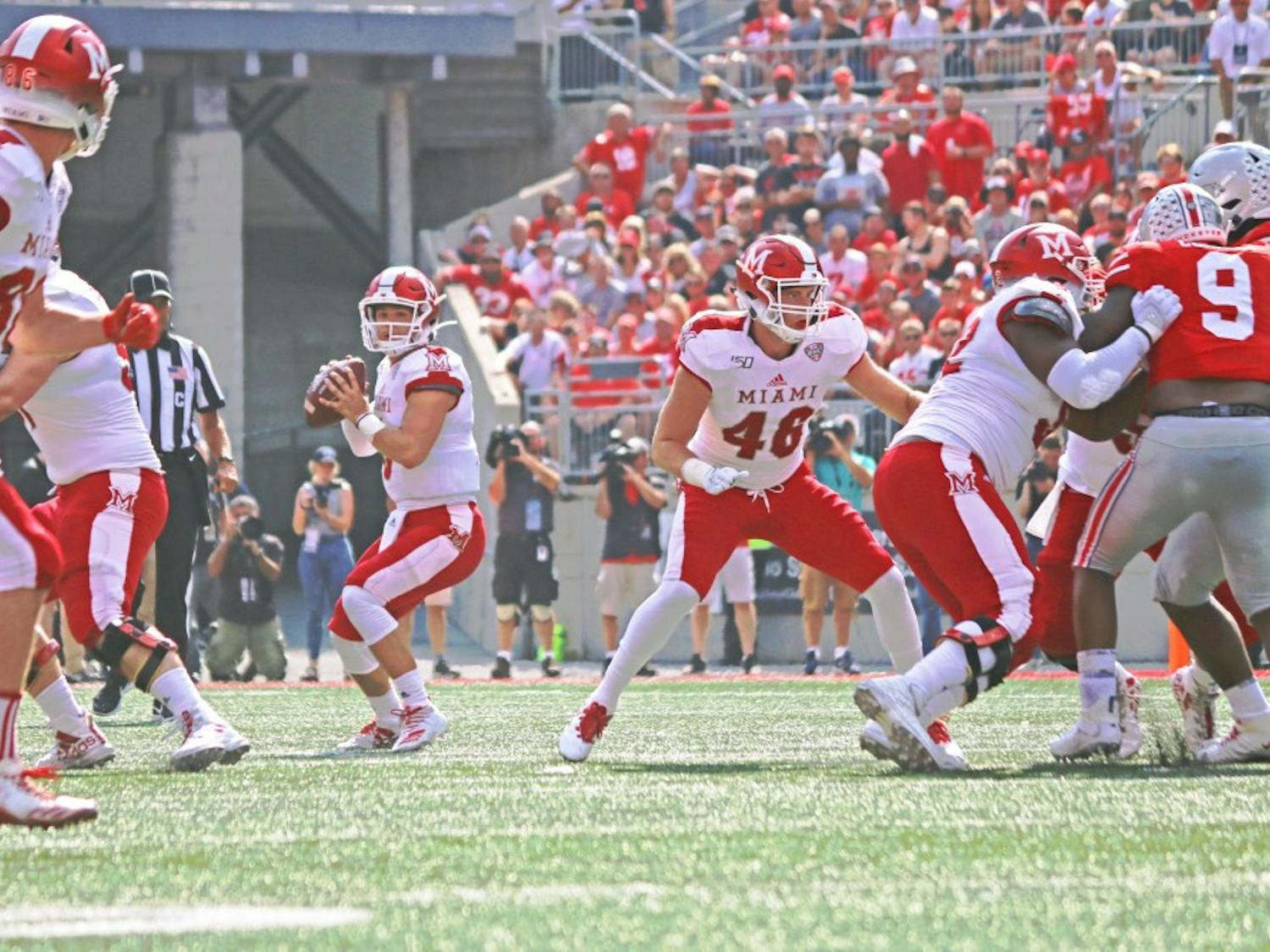 Freshman Quarterback Brett Gabbert looks toward redshirt senior wide receiver Luke Mayock. Gabbert is questionable for this week's game.