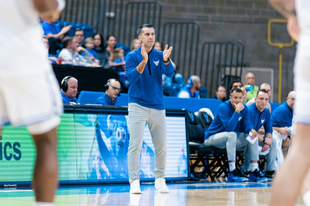 A photo of men’s basketball head coach George Halcovage III.