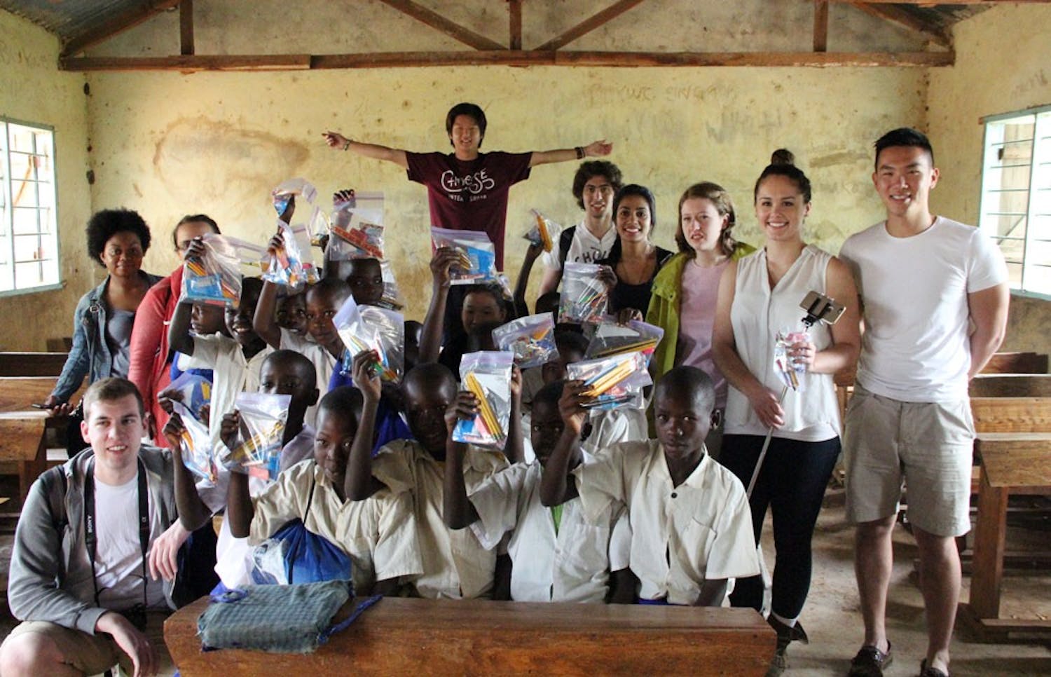 Tyler Choi raised over 2,000 school supplies and $1,000 in donations. He made 230 bags with school supplies and gave them to the principal of the primary school on his second trip to Tanzania.
