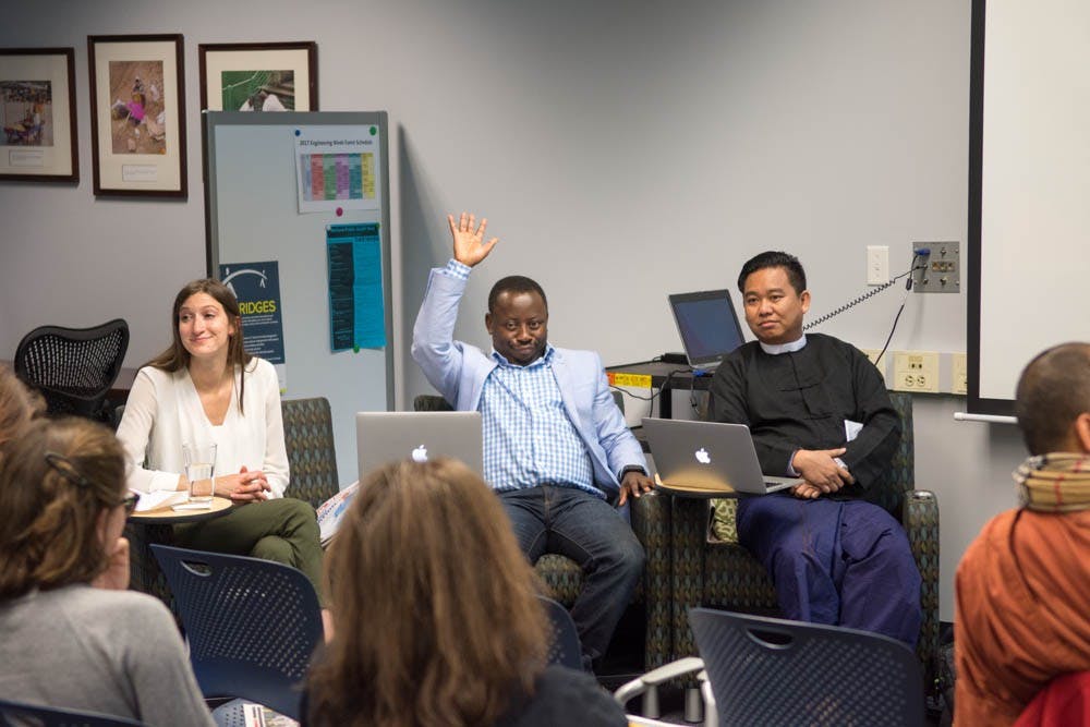 <p>Michelle Holler (left), Rubens Mukunzi (middle), Ze Yar Swe (right) met in 17 Norton Hall to discuss integrating refugees and immigrants into the Buffalo community.</p>