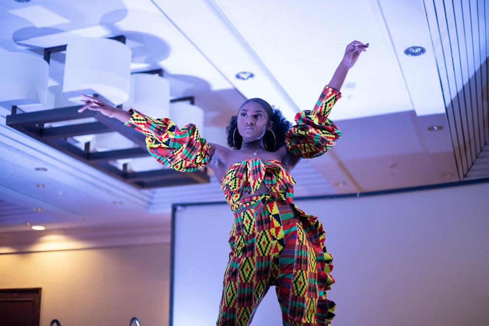 <p>Student modeling a jumpsuit from Aquamaia's line during BSU's Black Explosion.</p>