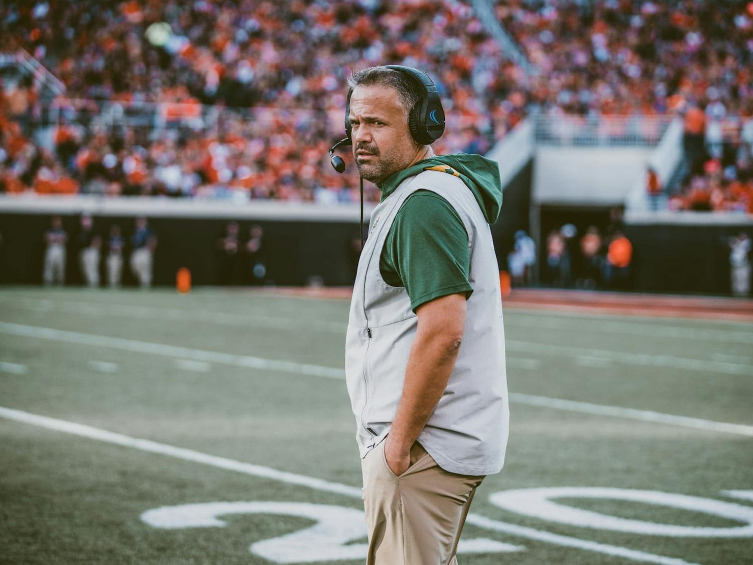 Baylor head coach Matt Rhule walks across the field