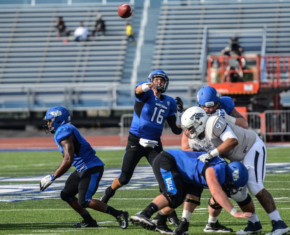 <p>Former UB quarterback Joe Licata throws against the Nevada Wolfpack. Licata opened up Joe Licata Football to develop high school athletes in Western New York.</p>