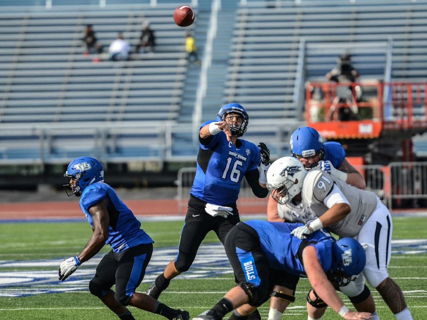 Former UB quarterback Joe Licata throws against the Nevada Wolfpack. Licata opened up Joe Licata Football to develop high school athletes in Western New York.