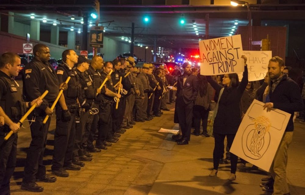 <p>Buffalo Police form a&nbsp;barricade in front of Trump&nbsp;protestors outside of the First Niagara Center.&nbsp;</p>