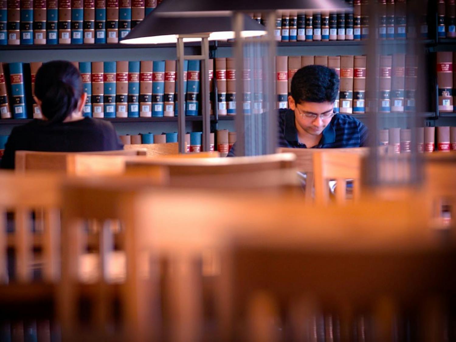 UB students study in the Law Library in O'Brian Hall. UB's law school has announced a new program that will allow some students admission to the school without taking the LSAT.