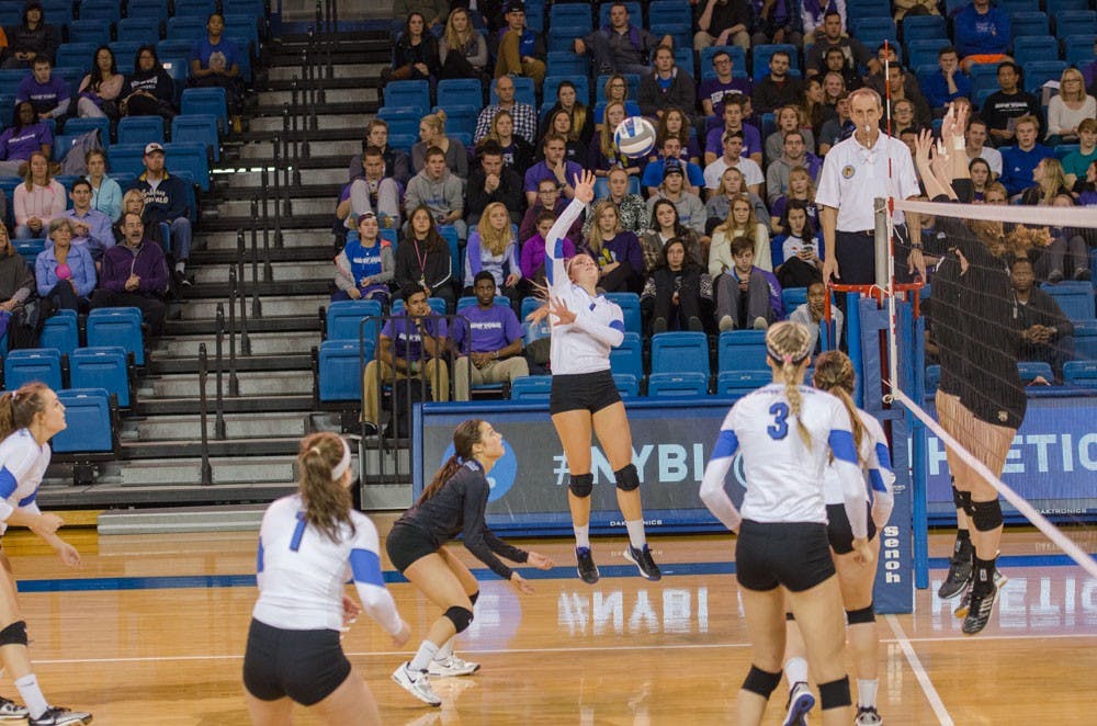 <p>Senior outside hitter Megan Lipski goes for a kill in the game against Western Michigan on Friday. Those who attended the game were given a purple t shirt to show their support for LGBTQ communities on #SpiritDay.</p>