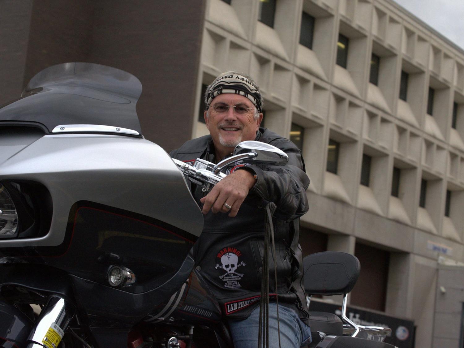 As a member of Bikers Against Child Abuse, Caribe provides comfort, safety and support for abused children. 