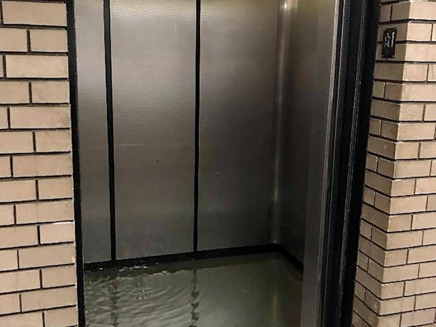 An elevator in Clemens hall is filled with water. The flooding was a result of a burst water valve on the fourth floor cooling system.&nbsp; 