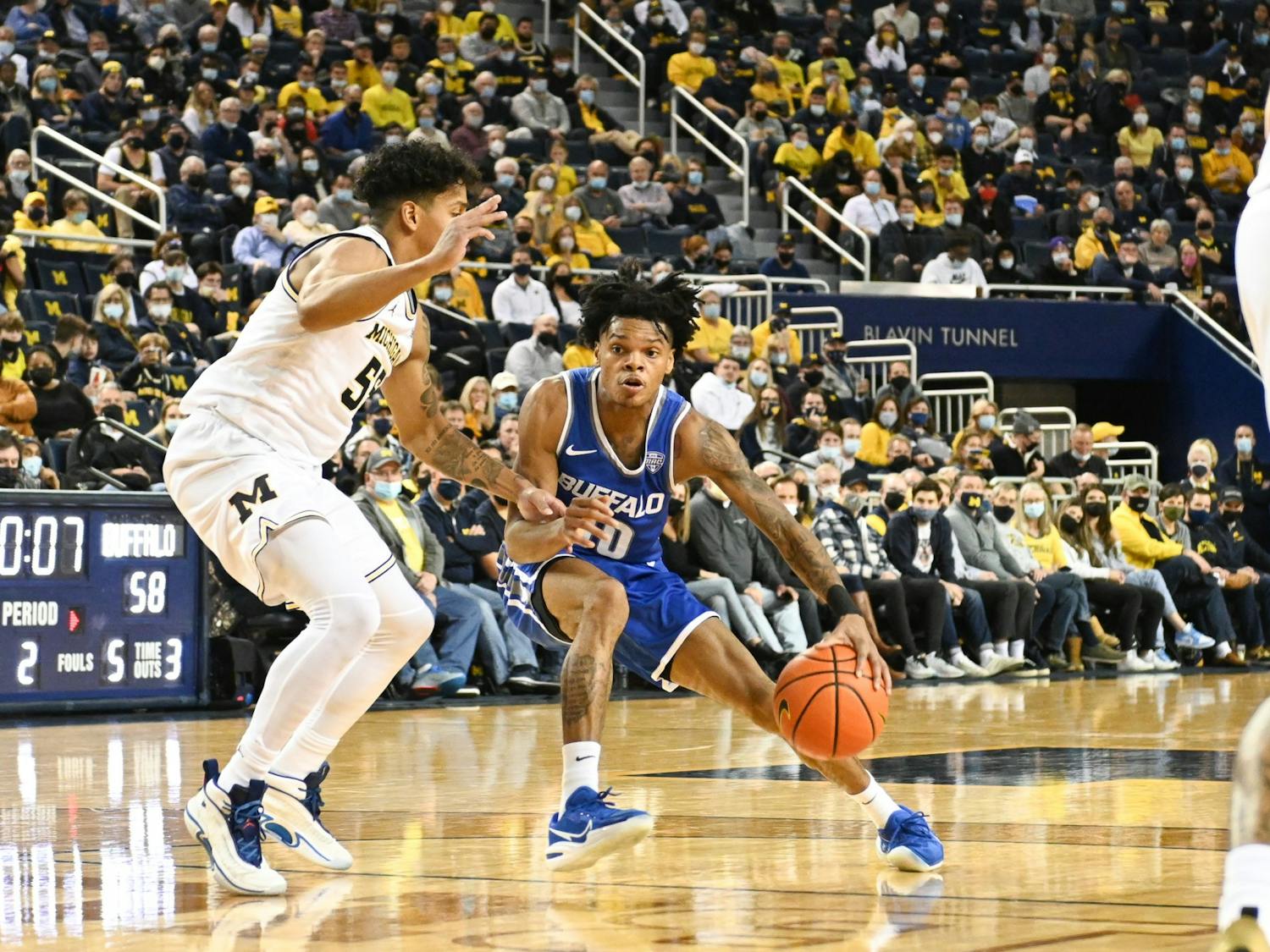Senior guard Ronaldo Segu drives into the lane during UB's 88-76 loss to Michigan Wednesday evening.