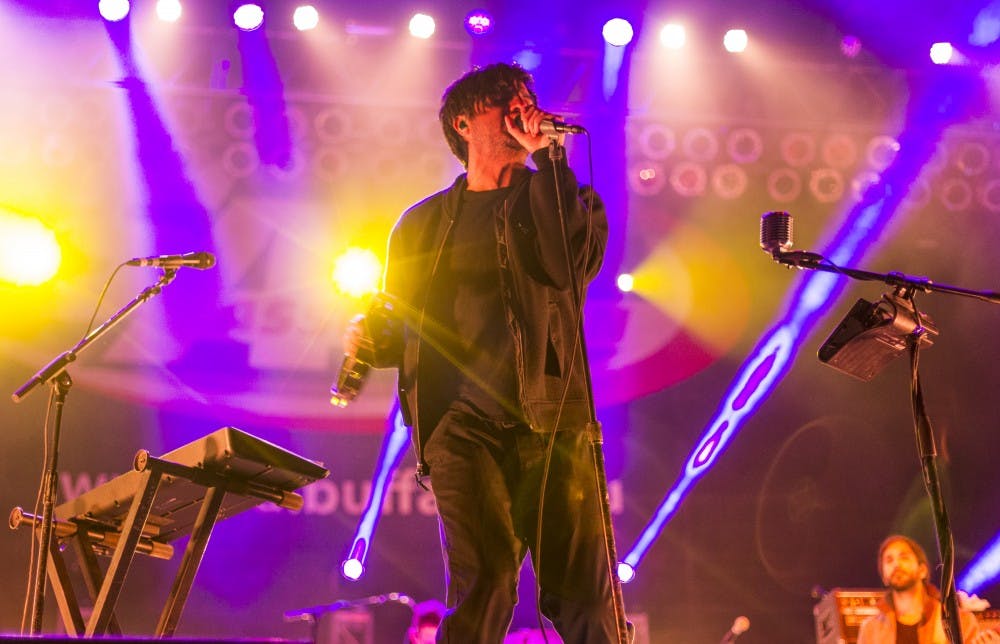 <p>Young the Giant frontman Sameer Gadhia performs at last year’s Spring Fest on May 2. The Student Association went with an alternative theme for the concert.</p>