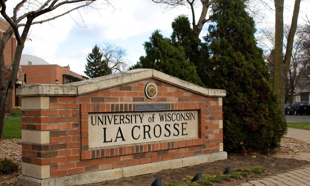A former UW-La Crosse police dispatcher is seeking a settlement after being fired for telling a student employee that “all immigrants deserved to go back to where they were from.”