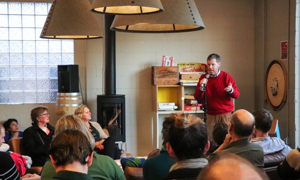 Dan Egan fields questions from a record-breaking crowd gathered at the Working Draft Brewery as part of the university’s Science on Tap lecture series.