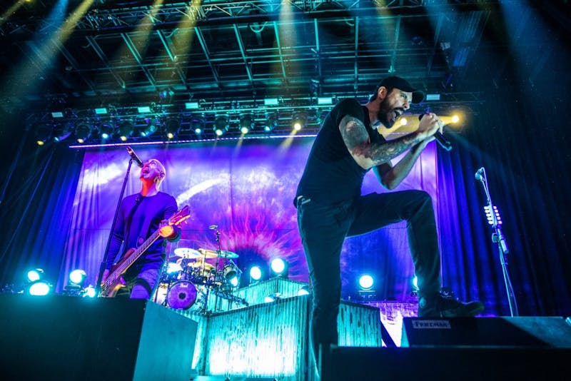 Ben Burnley (right) and bass guitarist Aaron Bruch (left) put on a colorful, blazing display at the Sylvee on March 25 with the rest of their band Breaking Benjamin. Skillet, Underoath and Fight the Fury also performed.