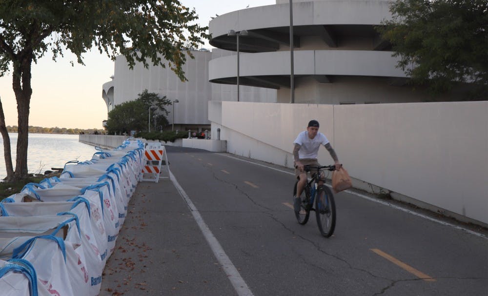 City engineers were forced to re-close parts of the Capitol City Bike Trail Wednesday, after the pumps draining floodwater from the trail were stolen Tuesday night.&nbsp;