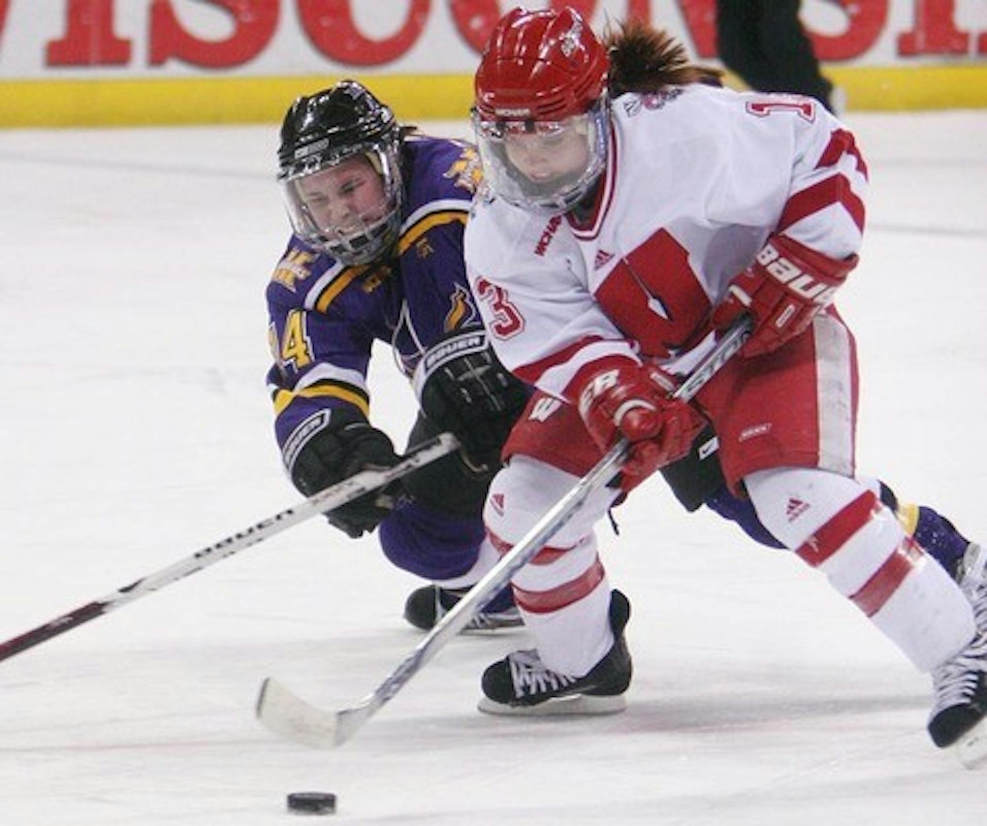 Lady icers pepper Minnesota-State netminders, remain unbeaten on the season