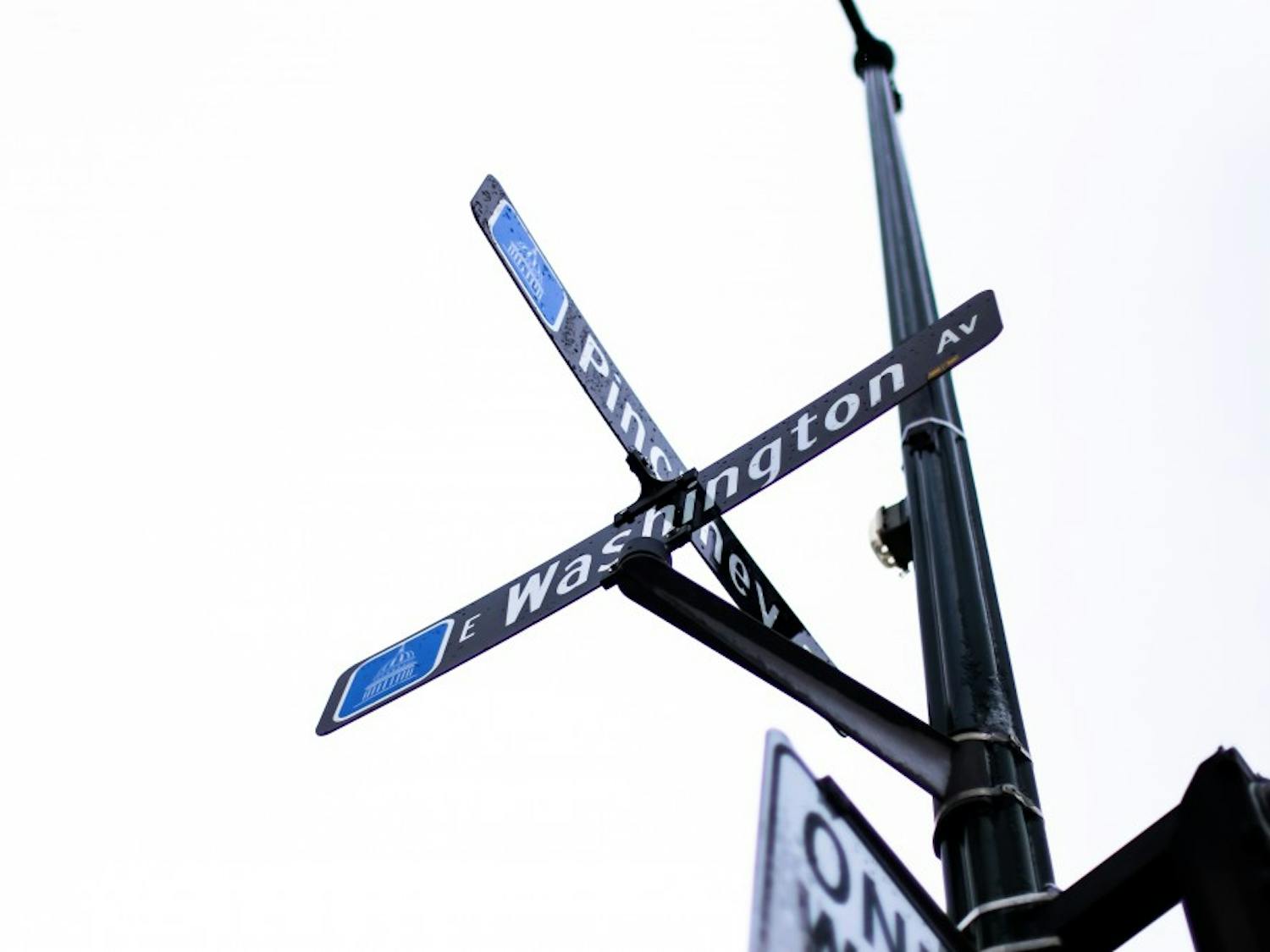 A 31-year-old man crashed into an East Washington Avenue hotel Wednesday after being shot multiple times by a suspect who is still at large.