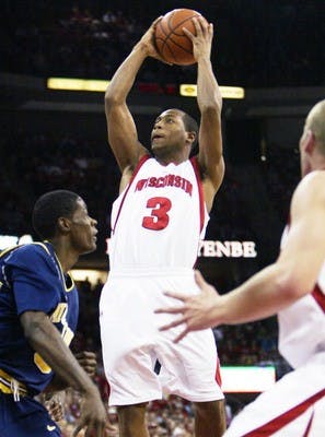 Badgers win close game 64-61