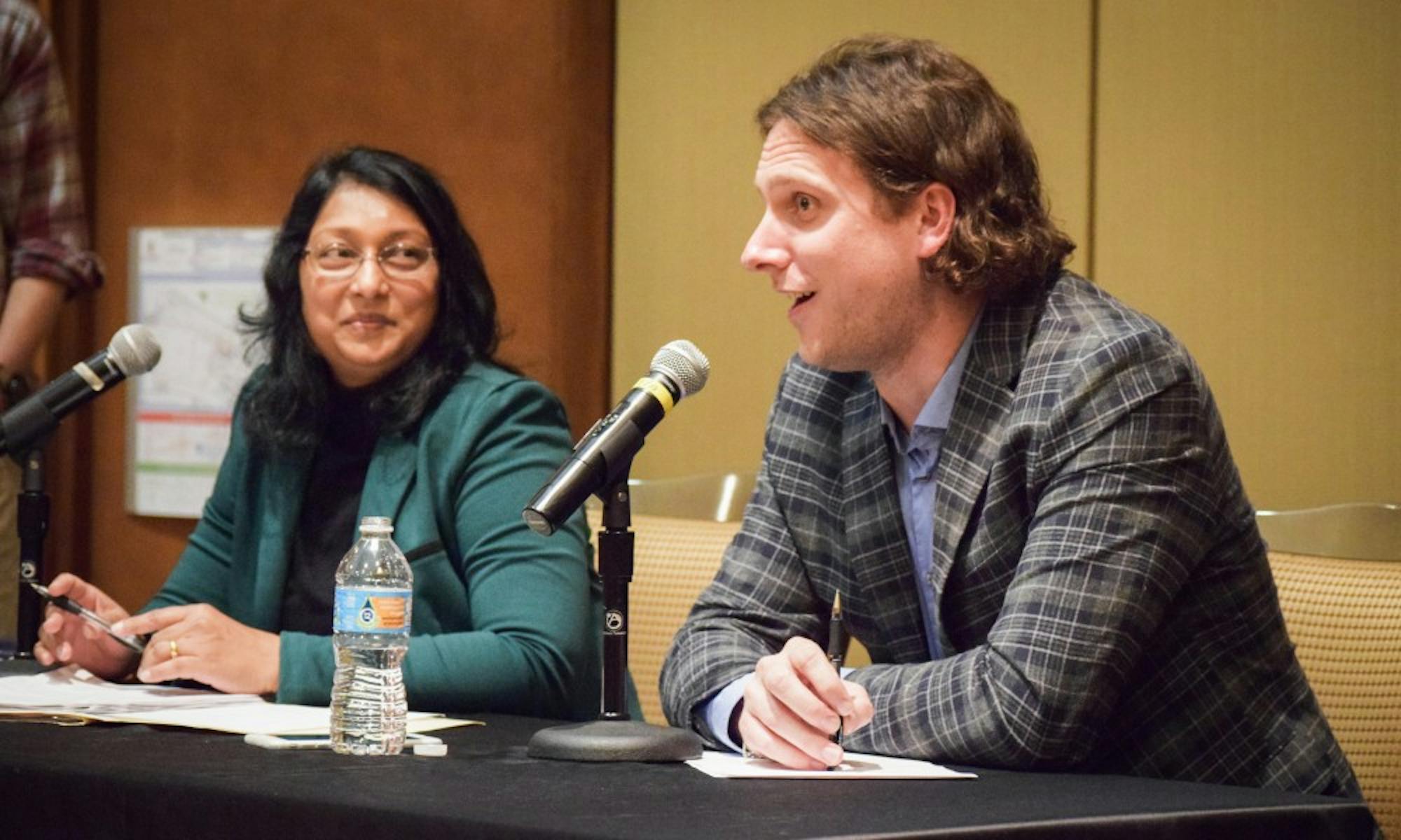 UW-Madison professor of applied economics Corbett Grainger stressed the importance of a global carbon tax to address climate change.