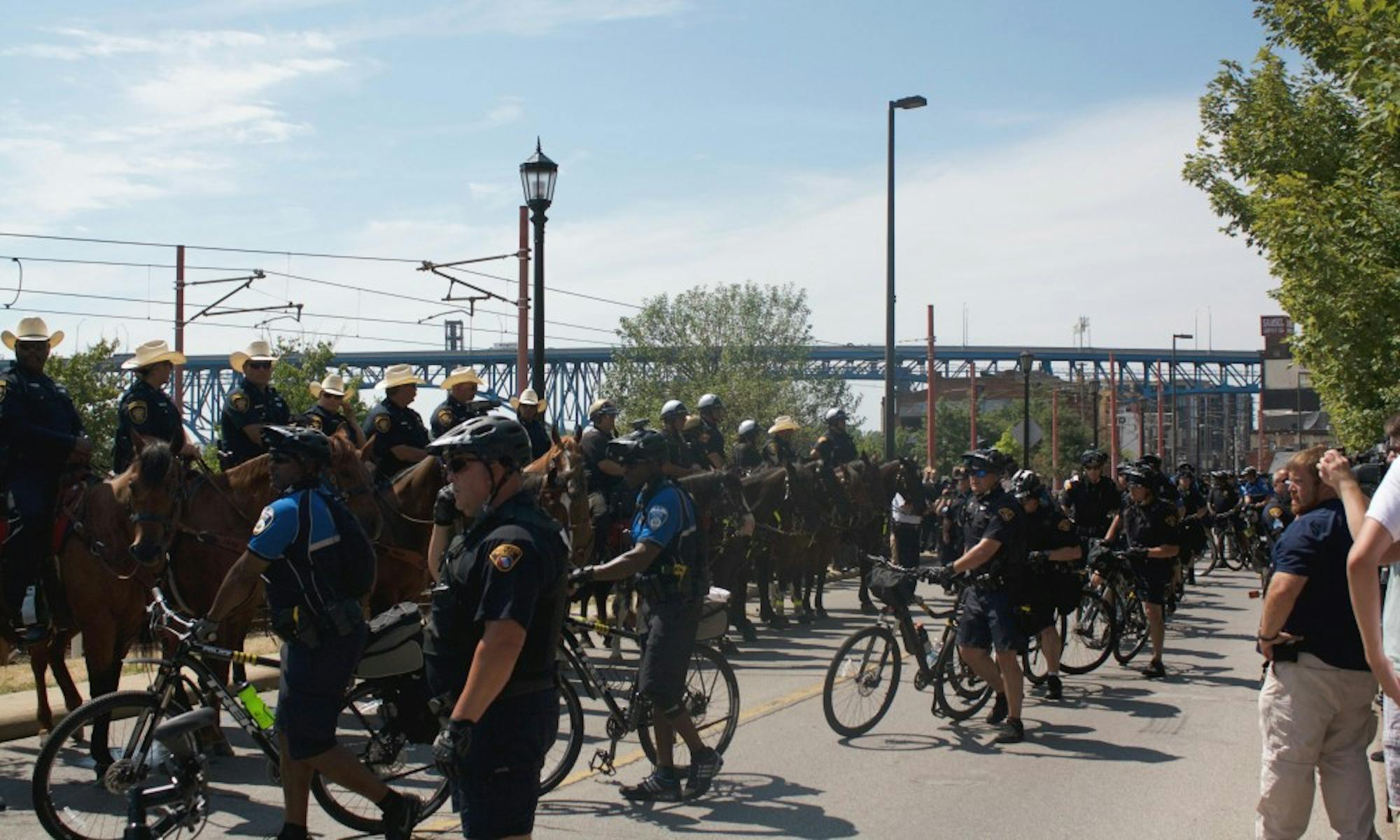 Local, state and federal law enforcement officials had to separate two groups of protesters after an argument broke out in downtown Cleveland just outside the Republican National Convention.