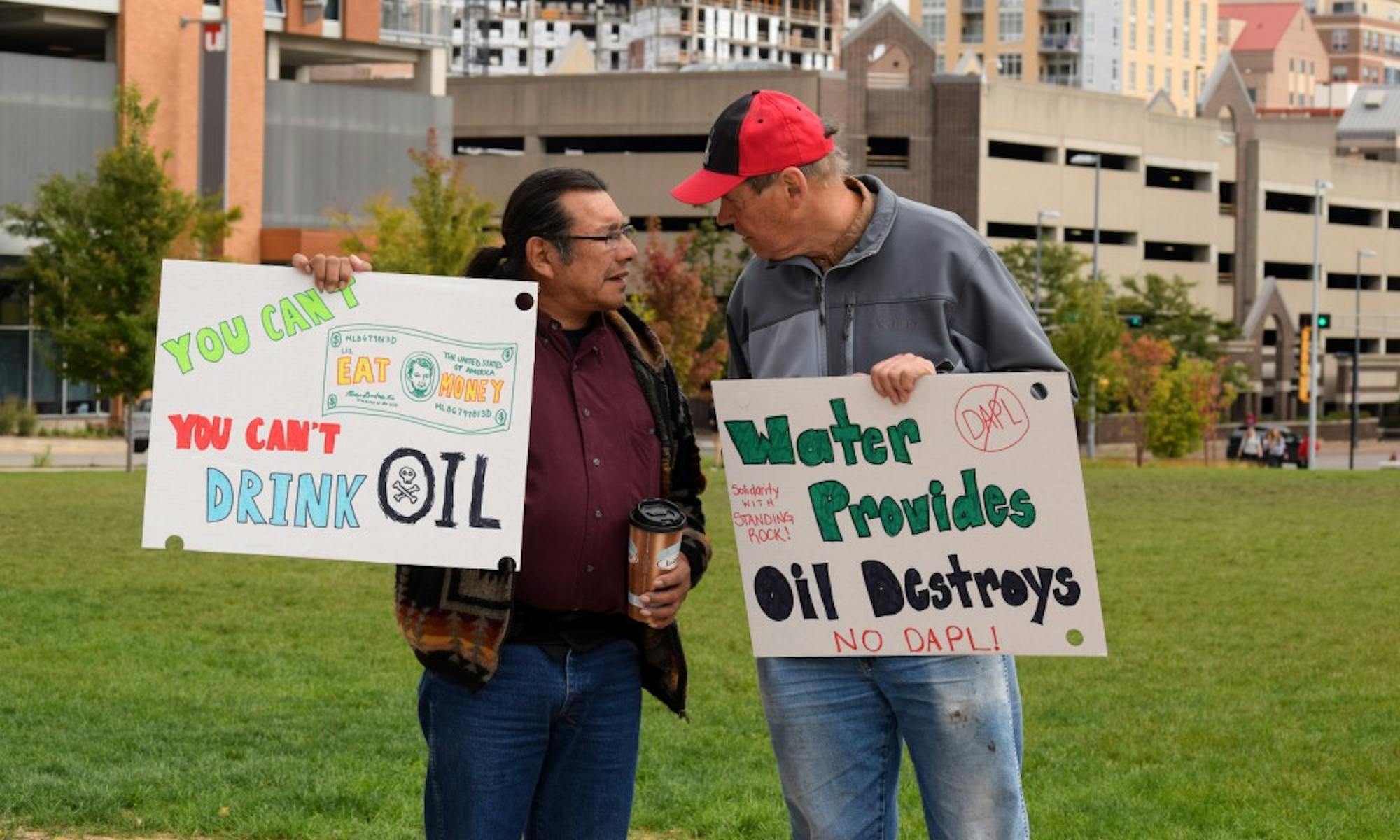 About two dozen community members rallied against the Dakota Access Pipeline Wednesday at Gordon Commons.